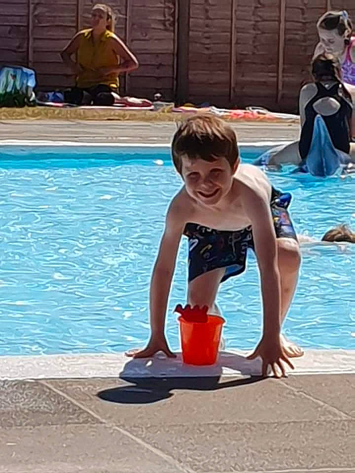 Tyler Thomas is registered to the contest to win money with this photo: fun, joy, leisure, leisure_centre, person, recreation, swimming_pool, vacation, water