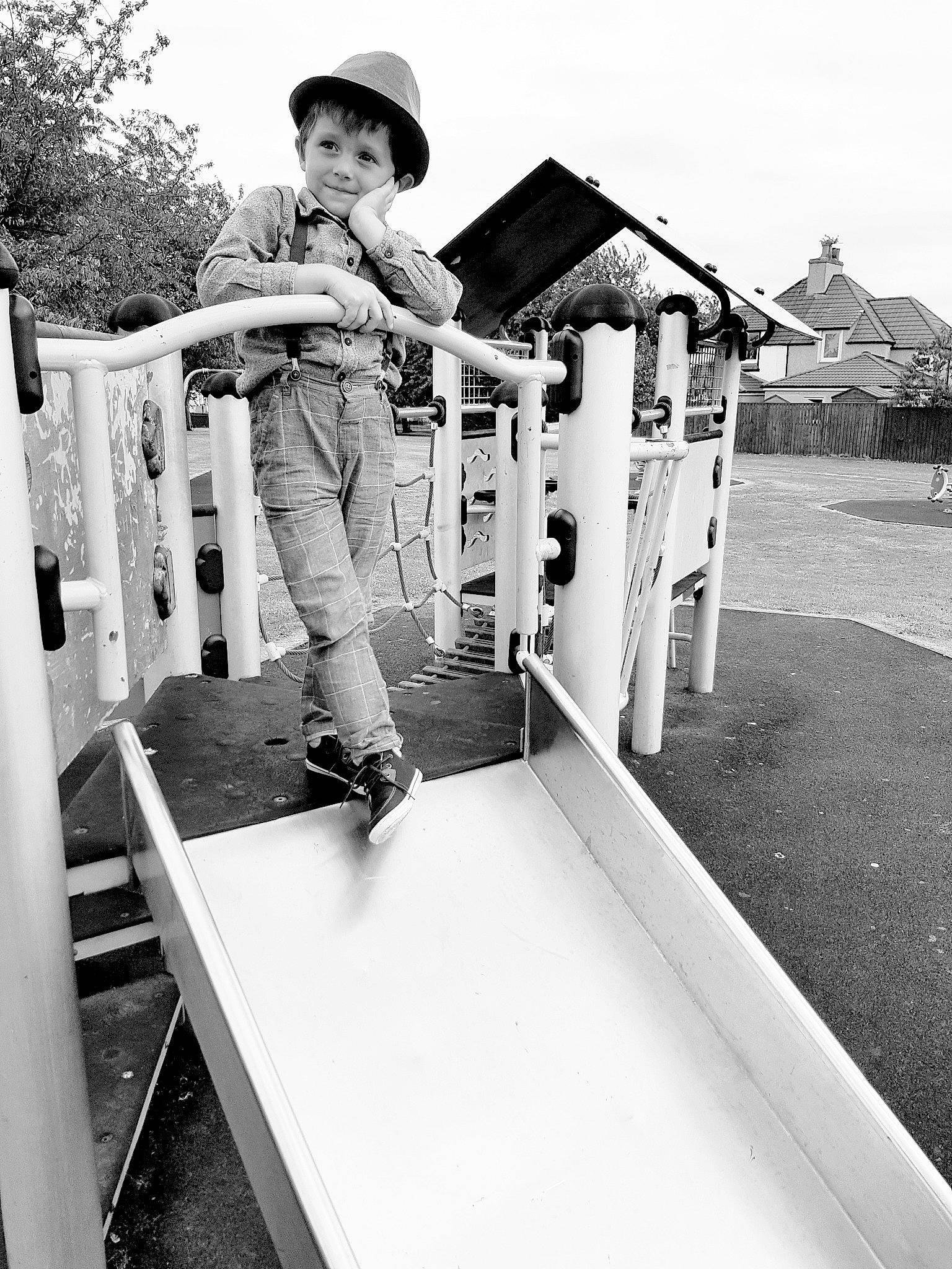 Kye Austin joined the competition — help win amazing prizes! black_and_white, child, house, monochrome, monochrome_photography, person, photography, play, playground, playground_slide, recreation, skateboard, snapshot, standing, style, white