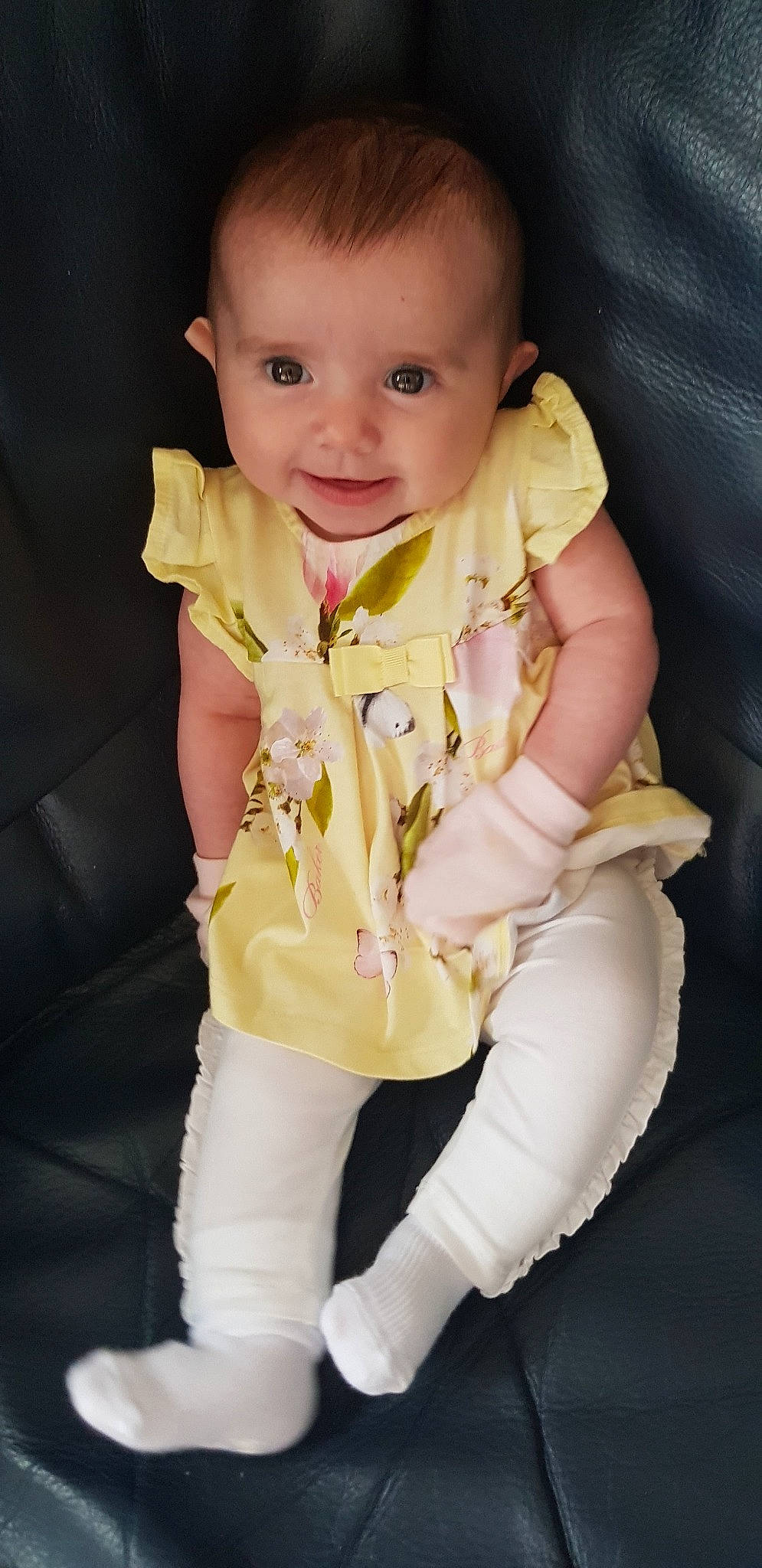 Aurora Clodie joined the competition — help win amazing prizes! arm, baby, cheek, child, child_model, chin, hand, leg, person, product, sitting, skin, sleeve, smile, toddler, yellow