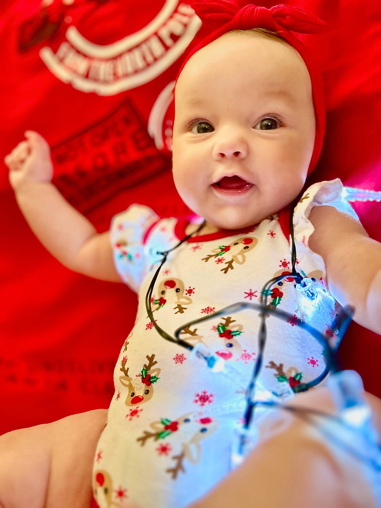 Maliah joined the competition — help win amazing prizes! baby, baby_products, baby_toddler_clothing, cheek, child, event, face, fun, happy, magenta, pattern, peach, person, pink, sitting, skin, sleeve, smile, t_shirt, thumb