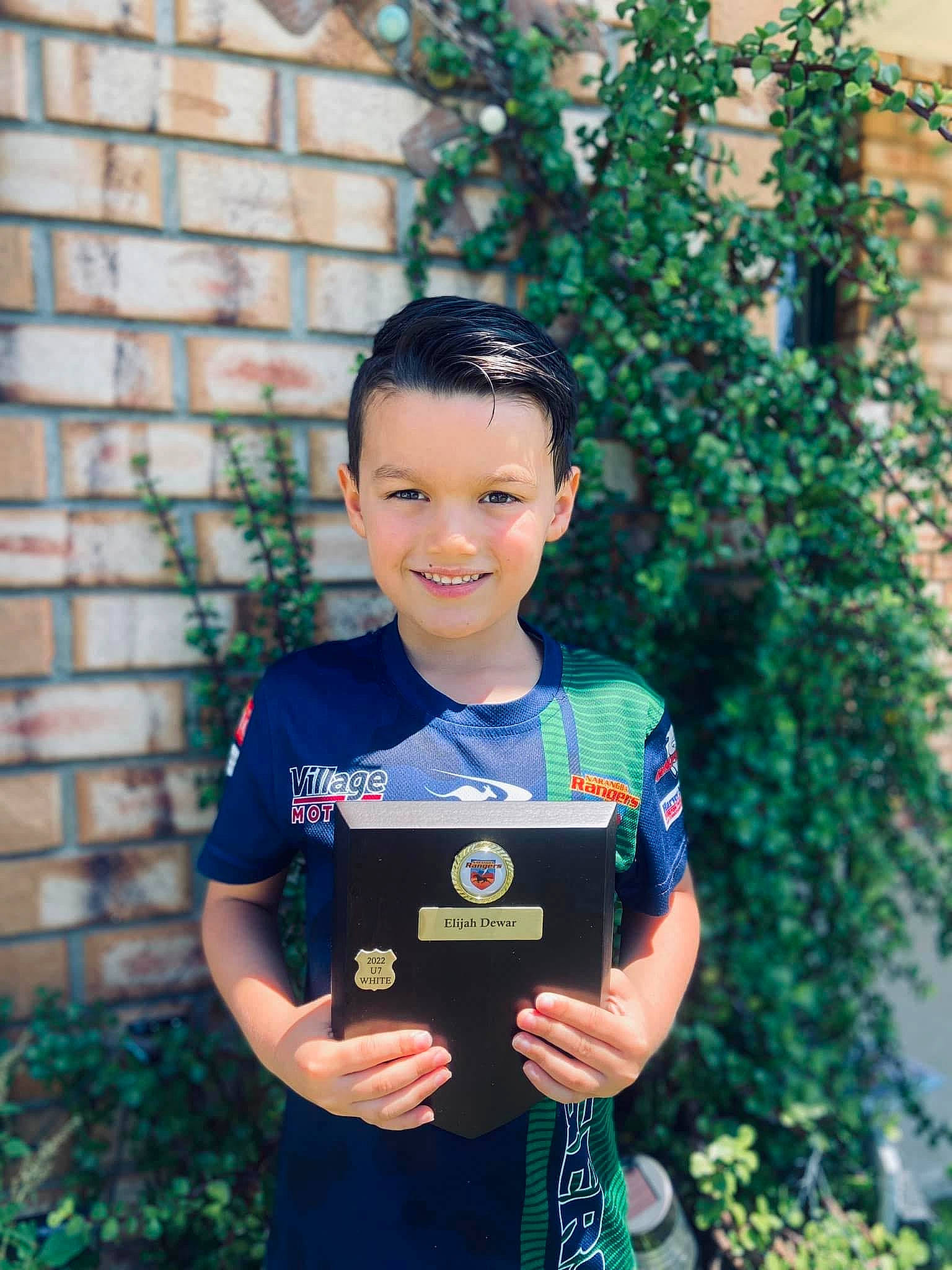 Elijah is registered to the contest to win money with this photo: child, electric_blue, event, face, fun, grass, happy, head, joy, leisure, people_in_nature, person, plant, portrait_photography, recreation, sleeve, smile, soil, t_shirt, tree