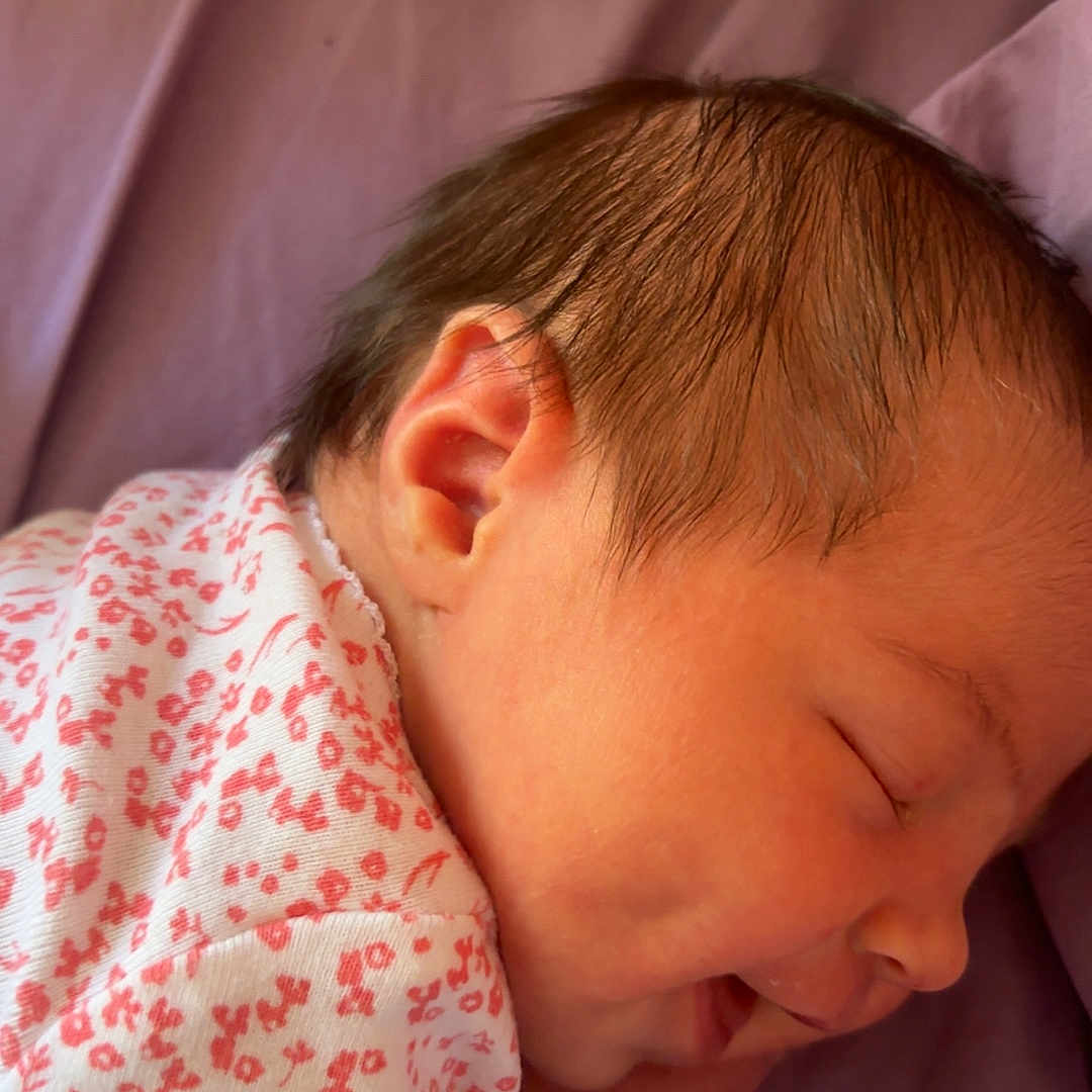 Harper joined the competition — help win amazing prizes! baby, blanket, bodypart, cushion, ear, face, finger, furniture, hand, head, homedecor, newborn, person, photography, portrait, sleeping