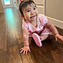 Amy joined the competition — help win amazing prizes! baby, child, girl, pigtails, smiling, indoor, wooden_floor, pink_clothing, shoe, cute, happy, portrait, crawling, person, home, hair_ties, floor, infant, toddler, playful