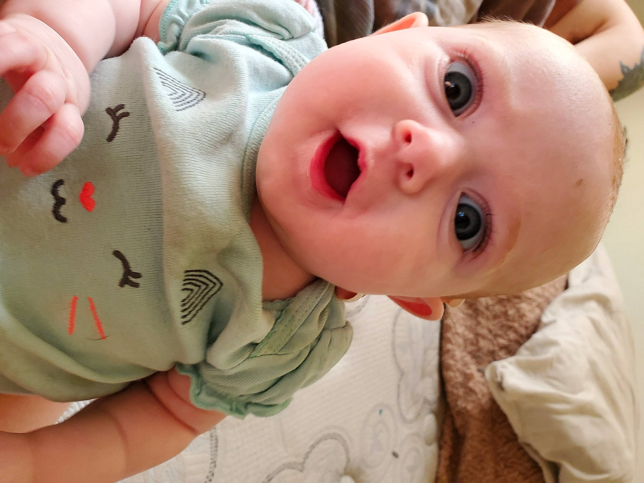 Legacy is registered to the contest to win money with this photo: baby, cheek, child, chin, ear, eye, face, finger, forehead, hand, head, lip, mouth, neck, nose, person, skin, surprise, toddler