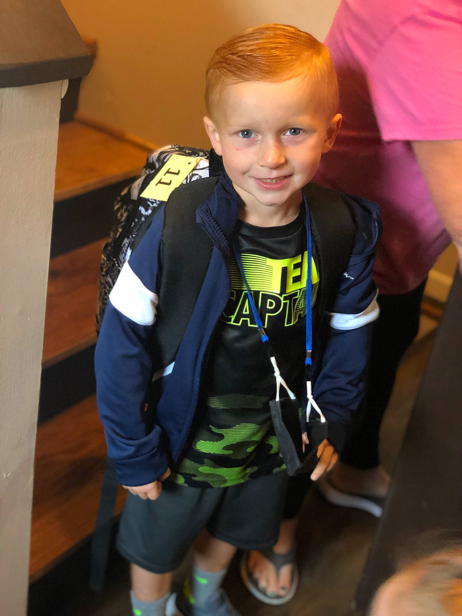 Johnathon is registered to the contest to win money with this photo: child, jacket, joy, outerwear, person, personal_protective_equipment, sportswear, t_shirt, toddler