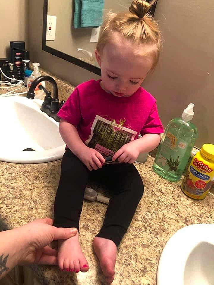 Bri is registered to the contest to win money with this photo: child, person, play, toddler