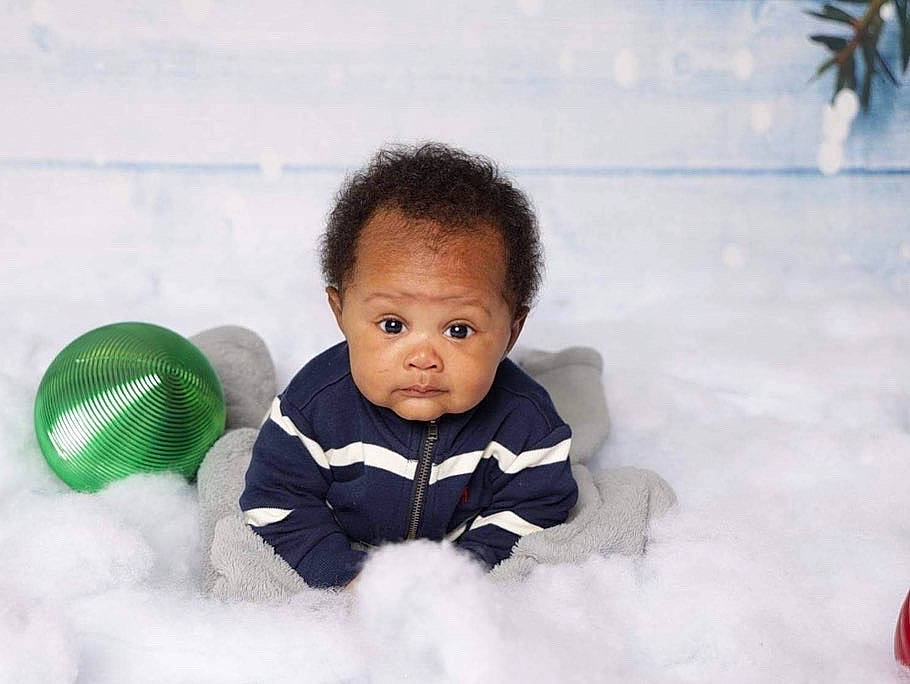 Alex joined the competition — help win amazing prizes! baby, baby_toddler_clothing, cheek, child, comfort, crawling, flash_photography, freezing, fun, grass, happy, houseplant, leisure, person, plant, playing_in_the_snow, recreation, sitting, snow, toddler