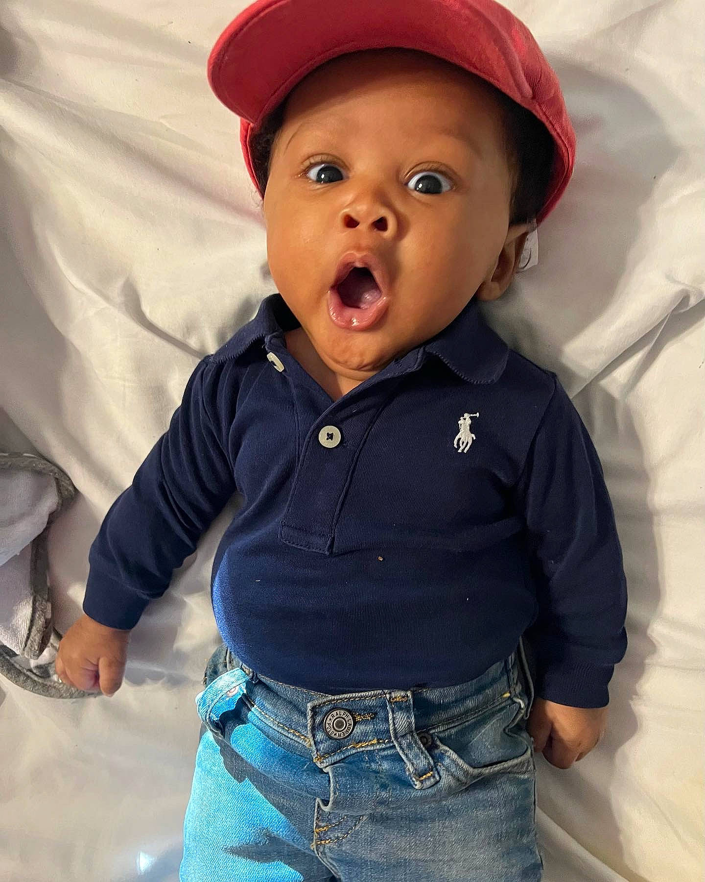 Alex joined the competition — help win amazing prizes! baby_toddler_clothing, cap, cheek, cool, eye, face, fun, gesture, happy, headgear, human_body, lip, mouth, nose, organ, outerwear, person, skin, sleeve, surprise