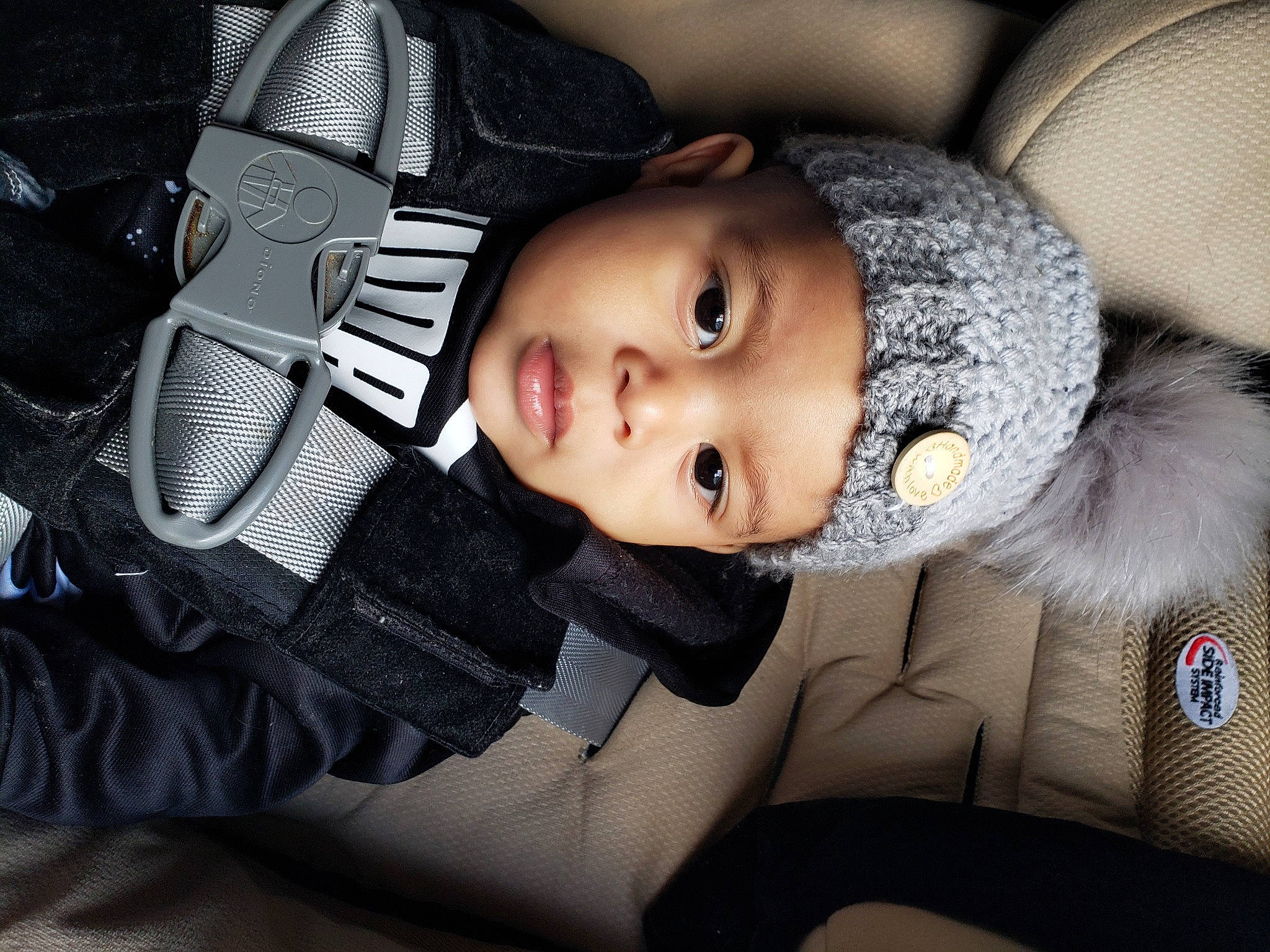 Jaz joined the competition — help win amazing prizes! auto_part, baby, baby_carriage, baby_products, baby_toddler_clothing, car_seat, carmine, cheek, child, comfort, fashion_accessory, flash_photography, fur, headwear, luxury_vehicle, person, personal_protective_equipment, sitting, toddler