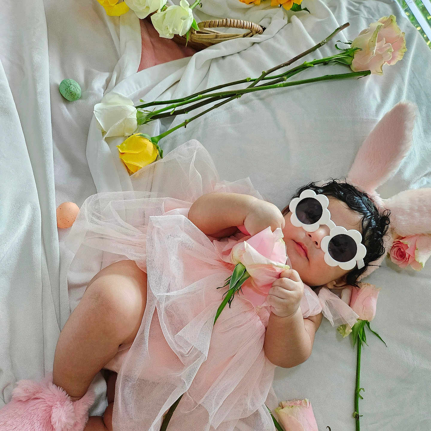 Merida is registered to the contest to win money with this photo: accessories, baby, blanket, bunny_ears, child, cute, decorative_flowers, flower, fluffy_slippers, headwear, indoor, infant, lying_down, pink_dress, relaxing, roses, soft_texture, sunflowers, sunglasses, tulle
