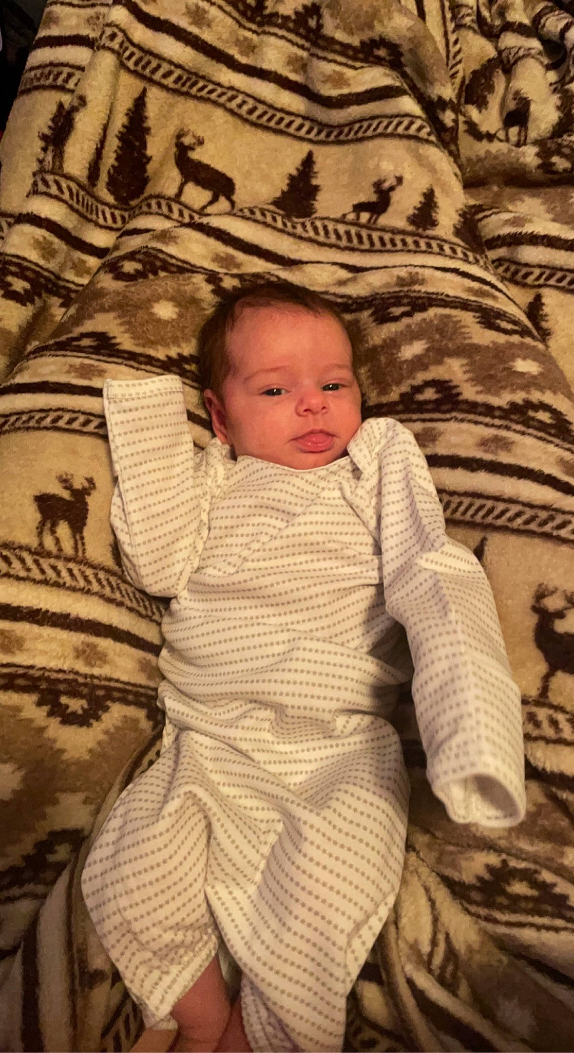 Lakelynn is registered to the contest to win money with this photo: baby, baby_toddler_clothing, cheek, child, comfort, eye, flooring, head, human_body, linens, pattern, person, room, sitting, skin, sleeve, textile, toddler, vintage_clothing, wood