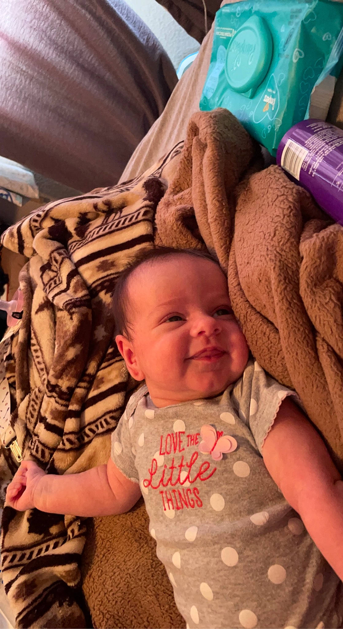 Lakelynn is registered to the contest to win money with this photo: baby, baby_toddler_clothing, cheek, child, chin, comfort, eye, finger, head, human, linens, mouth, nose, person, pink, product, skin, sleeve, smile, textile