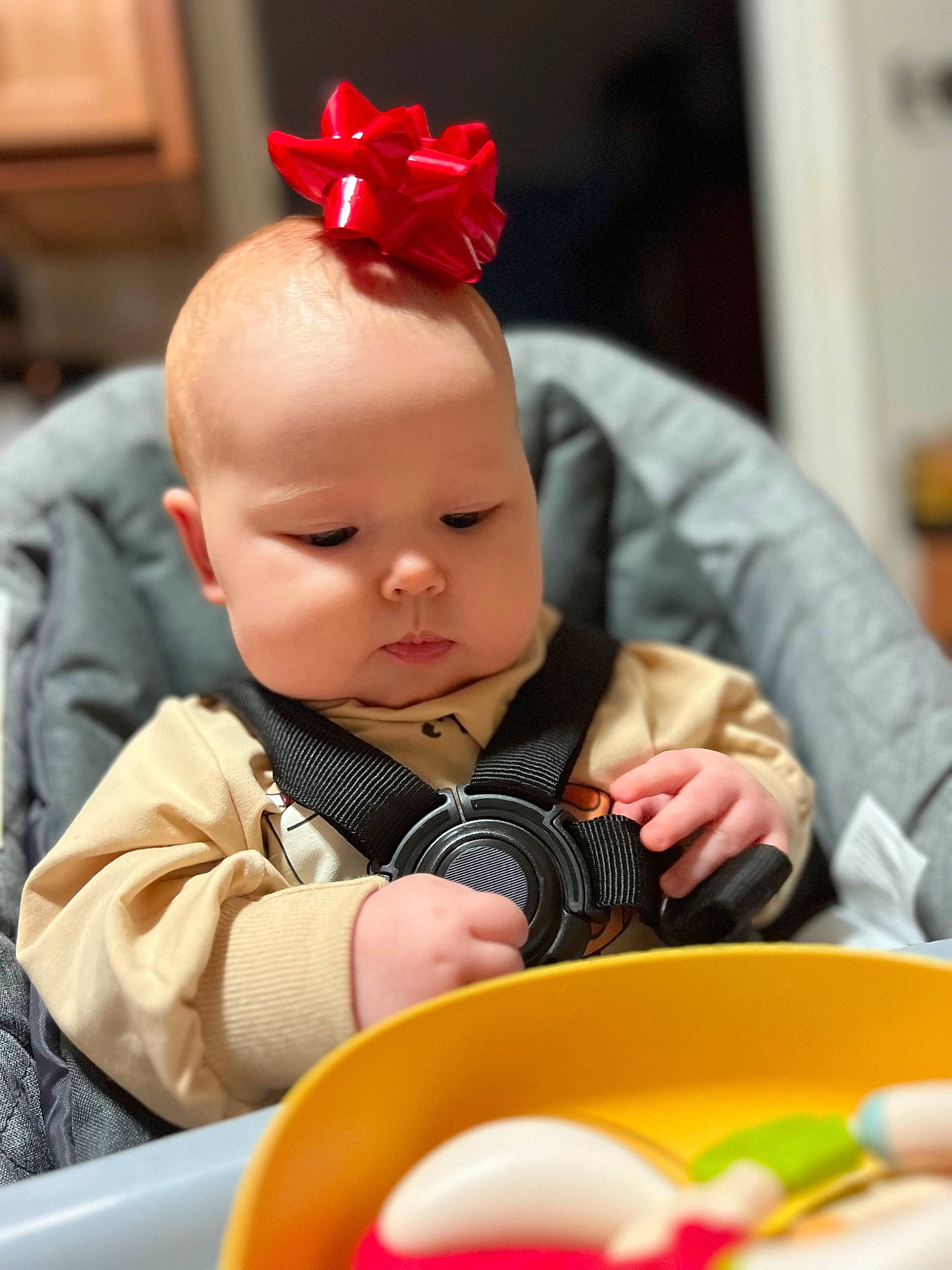 Gwen is registered to the contest to win money with this photo: baby, baby_toddler_clothing, carmine, cheek, child, crown, eyelash, fashion_accessory, finger, fun, headband, headpiece, orange, people, person, plate, red, sitting, tableware, toddler