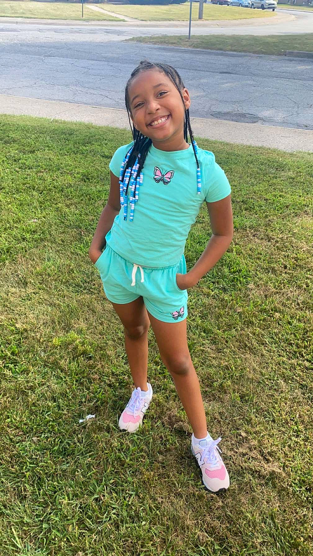 Azya is registered to the contest to win money with this photo: baby_toddler_clothing, electric_blue, eye, face, fun, grass, grassland, hair, happy, head, joy, leisure, people_in_nature, person, recreation, sleeve, smile, summer, t_shirt, thigh