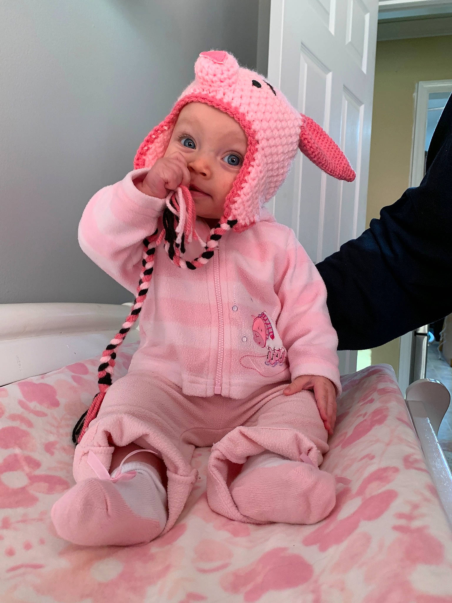 Harlee is registered to the contest to win money with this photo: baby, child, costume, ear, headgear, outerwear, pajamas, person, pink, skin, sleeve, toddler
