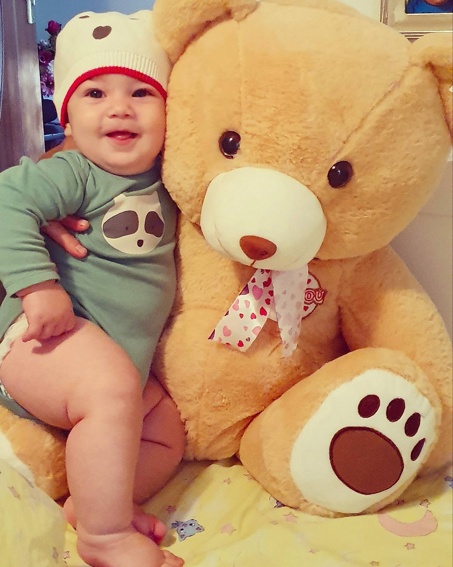Matei is registered to the contest to win money with this photo: baby, baby_toddler_clothing, baby_toys, cap, child, comfort, happy, head, headwear, nose, person, pink, plush, product, skin, smile, stuffed_toy, textile, toddler, toy