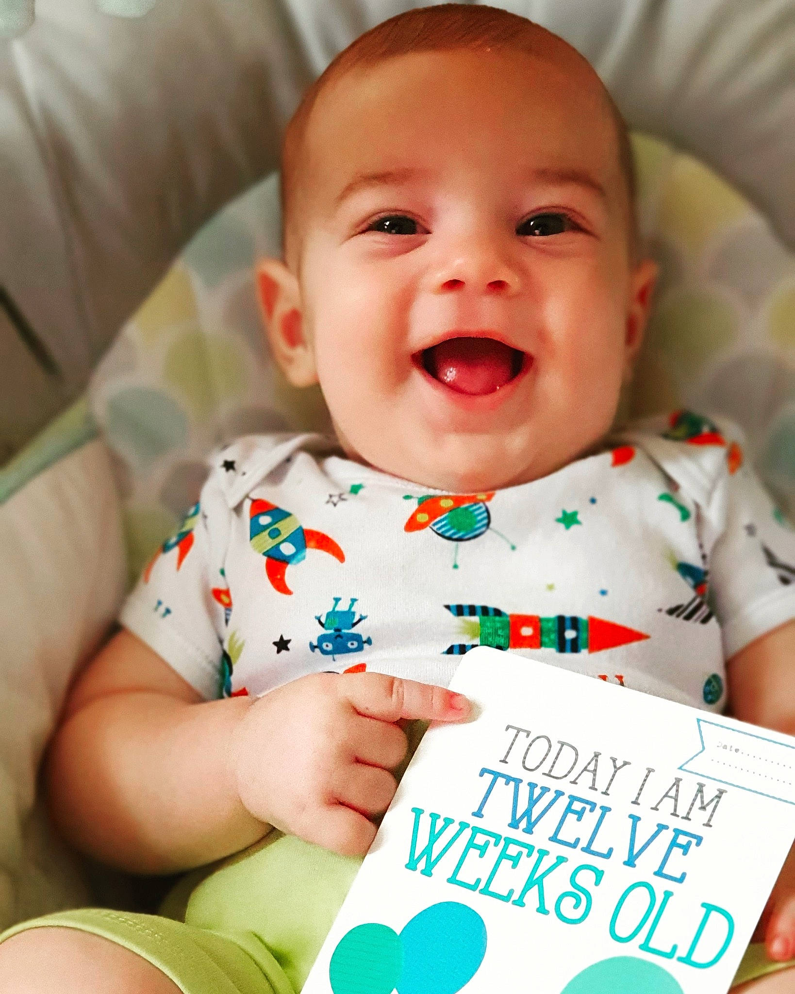Matei joined the competition — help win amazing prizes! baby, baby_products, baby_toddler_clothing, cheek, child, chin, comfort, face, fun, green, happy, iris, pattern, person, product, publication, skin, sleeve, smile, toddler