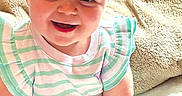 Aries joined the competition — help win amazing prizes! baby, child, smiling, headband, bow, striped_clothing, mint_color, white_clothing, sitting, blanket, cozy, happy, infant, cute, indoors, portrait, soft_texture, skin, face, person