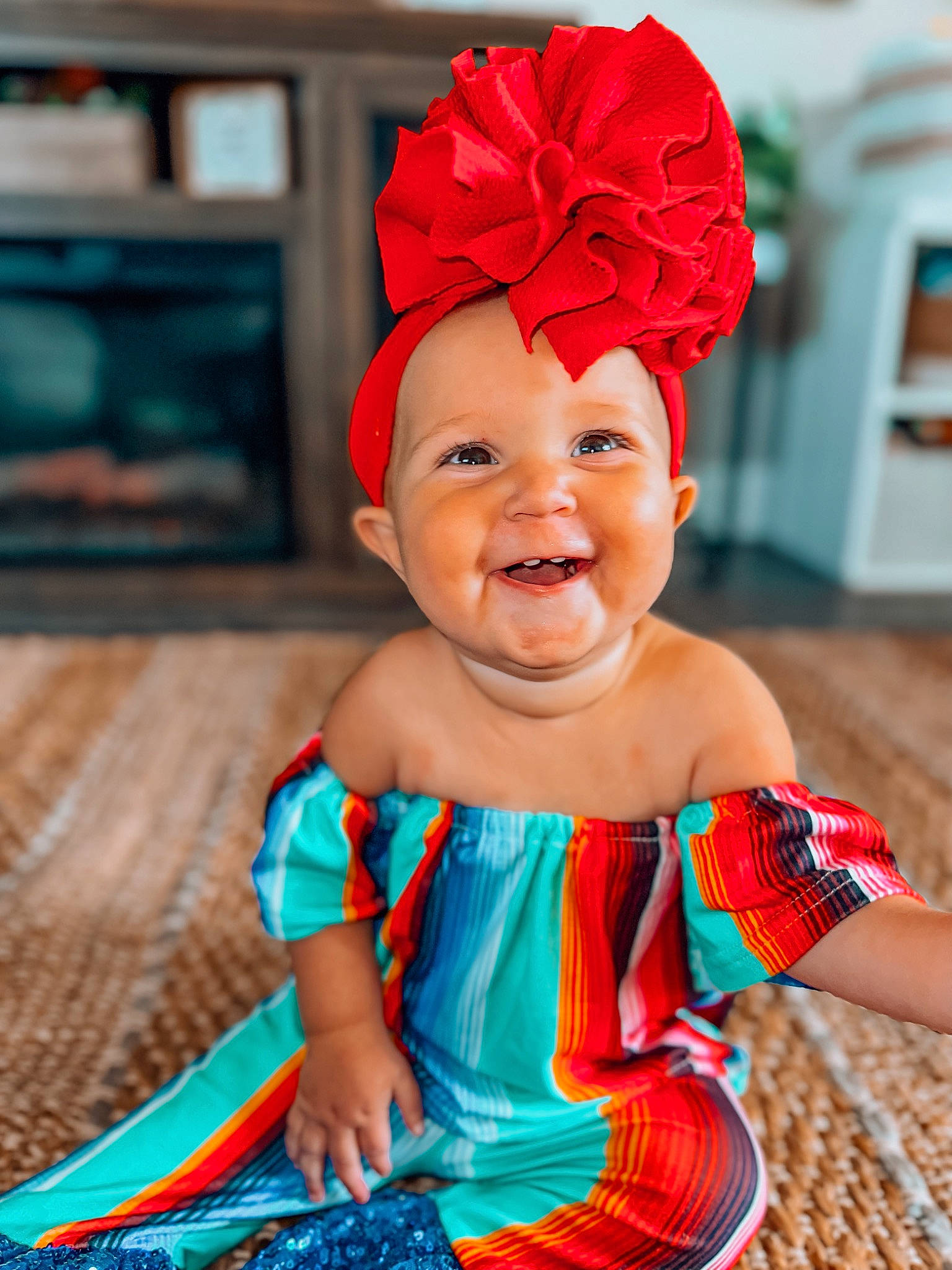 Adelaine is registered to the contest to win money with this photo: baby, baby_toddler_clothing, child, dress, event, face, fun, happy, hat, head, headband, headpiece, joy, magenta, orange, pattern, peach, person, pink, red