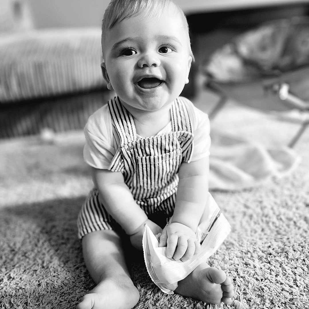 Elijah joined the competition — help win amazing prizes! ankle, baby, babylaughing, bodypart, couch, crawling, face, finger, furniture, hand, happy, head, laughing, newborn, person, photography, portrait, sitting, smile, standing