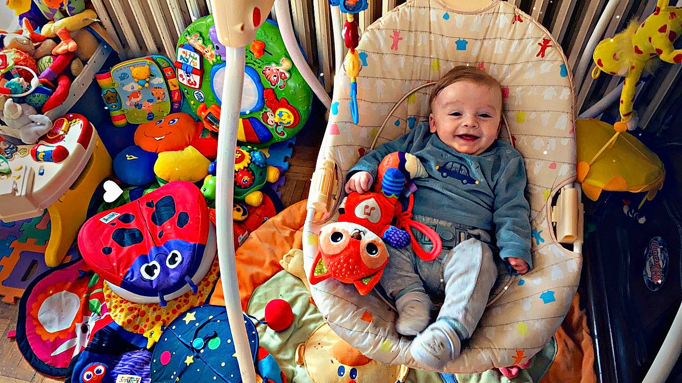 Kenzo participe au concours pour gagner de l'argent avec cette photo : baby, baby_toddler_clothing, child, community, event, facial_expression, fun, happy, human_body, joy, leisure, mammal, orange, person, photograph, product, smile, snapshot, textile, toddler