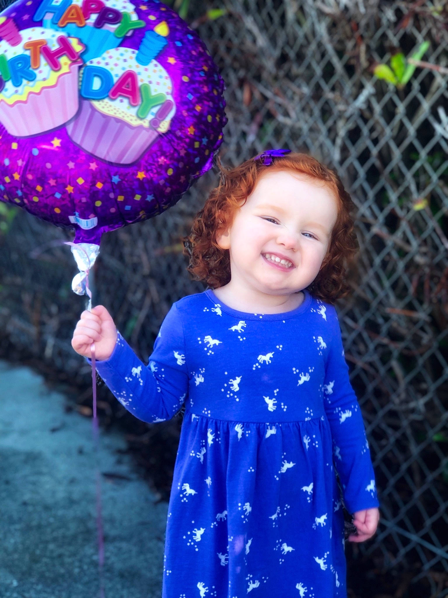 Evalynn joined the competition — help win amazing prizes! balloon, blue, child, design, fun, happy, joy, party, party_supply, pattern, person, purple, smile, toddler, violet