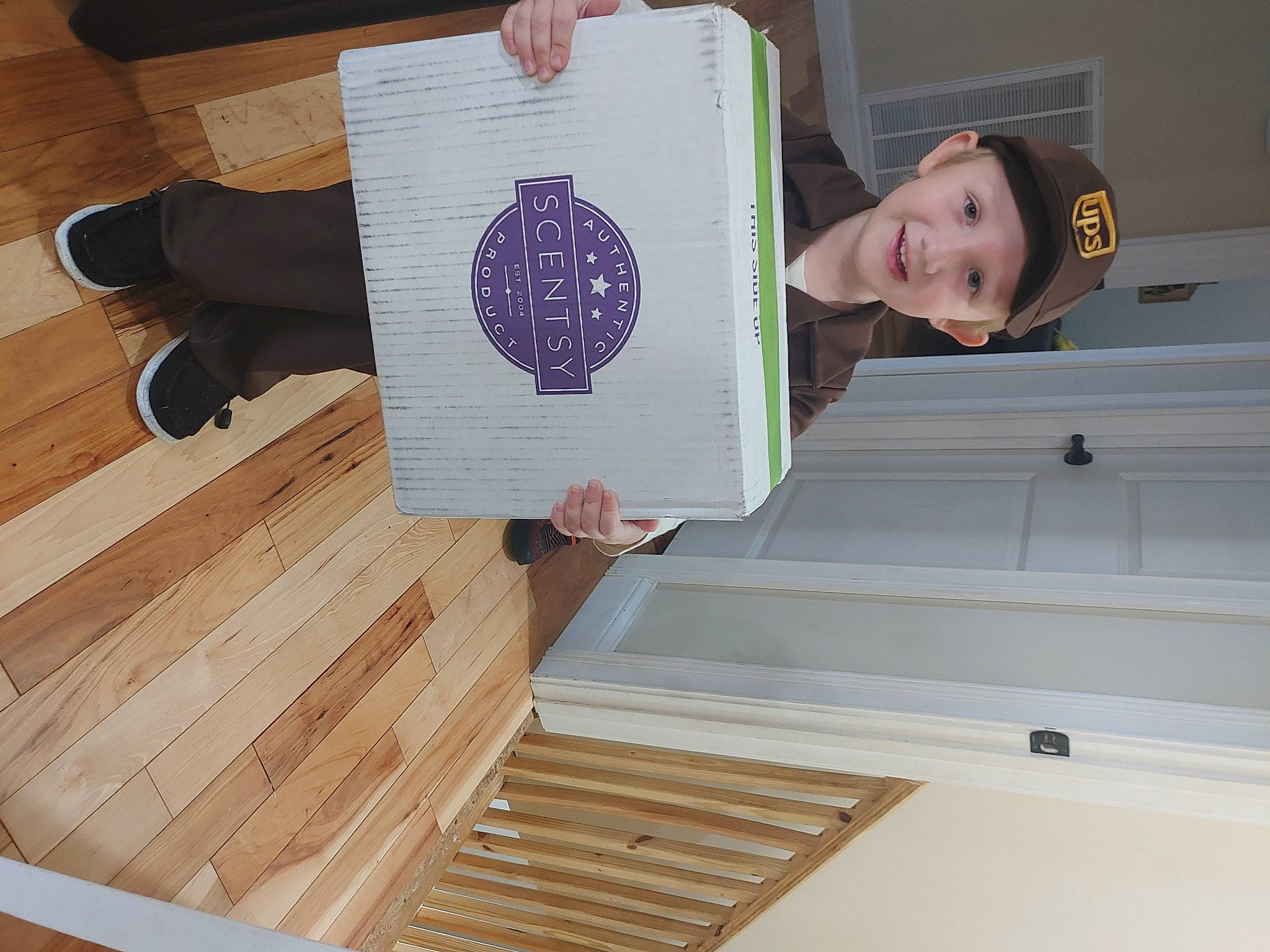 Chester joined the competition — help win amazing prizes! ceiling, flooring, hardwood, headwear, joy, laminate_flooring, lumber, pattern, person, plank, plywood, rectangle, room, sleeve, smile, stairs, t_shirt, toddler, varnish, wood