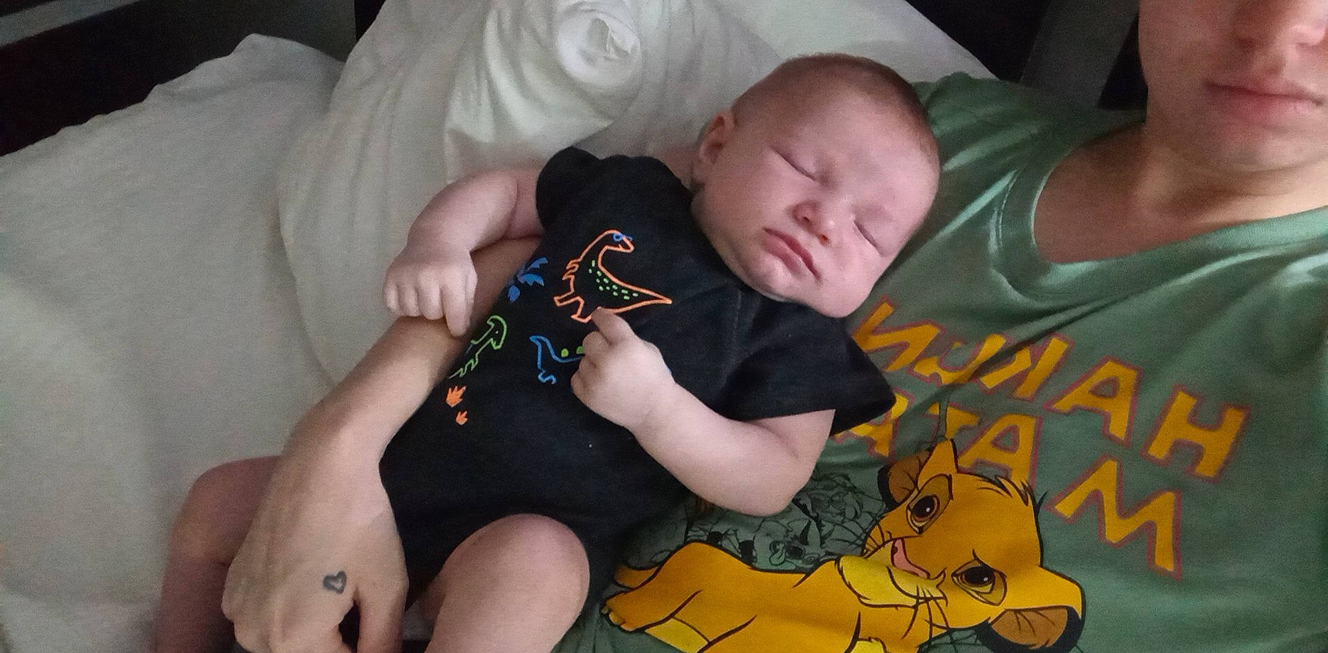 Derrick joined the competition — help win amazing prizes! arm, baby, baby_toddler_clothing, child, comfort, finger, human_body, human_leg, knee, lap, leg, linens, pattern, person, sitting, skin, sleeve, sock, textile, thigh