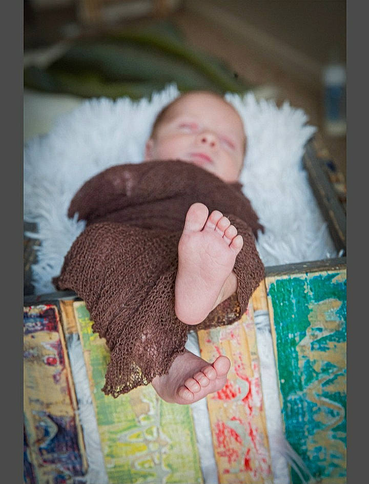 Austin is registered to the contest to win money with this photo: art, baby, baby_products, baby_sleeping, baby_toddler_clothing, bed, bedtime, comfort, couch, eye, infant_bed, linens, nail, pattern, person, sleeve, textile, toddler, wood, wool