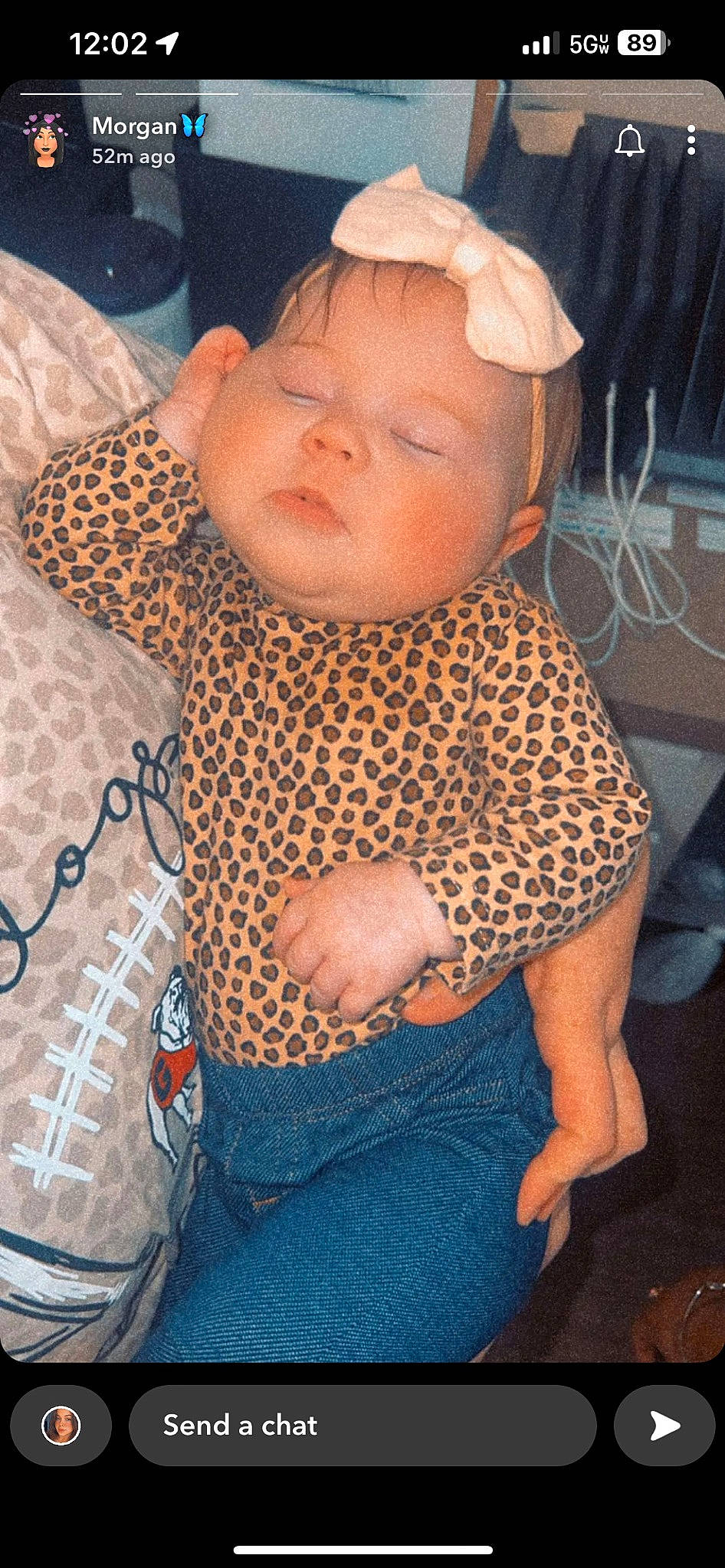 Oakley is registered to the contest to win money with this photo: baby, baby_products, baby_toddler_clothing, cheek, chest, electric_blue, eye, face, fashion_accessory, hairstyle, head, iris, lip, pattern, person, sitting, skin, sleeve, textile, toddler