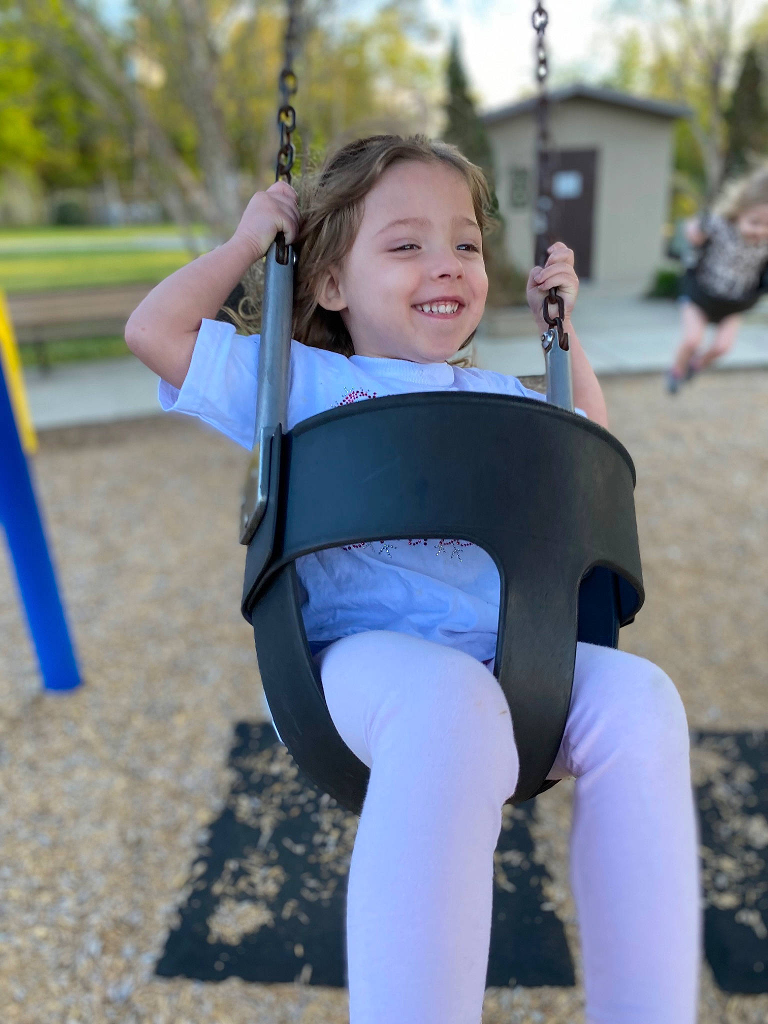 Karina joined the competition — help win amazing prizes! city, electric_blue, fun, grass, happy, human_leg, joy, knee, leisure, person, playground, recreation, sleeve, smile, sportswear, standing, swing, t_shirt, thigh, tree