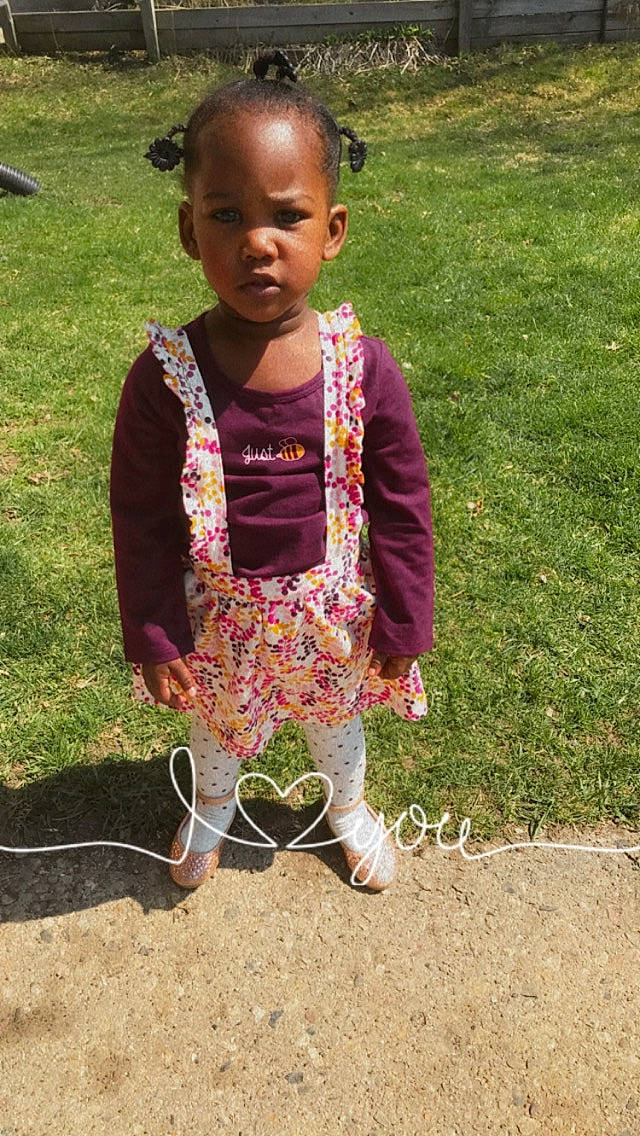 Juliana joined the competition — help win amazing prizes! baby, baby_toddler_clothing, child, face, foot, fun, grass, happy, head, jewellery, magenta, pattern, people_in_nature, person, pink, plant, play, sleeve, soil, t_shirt