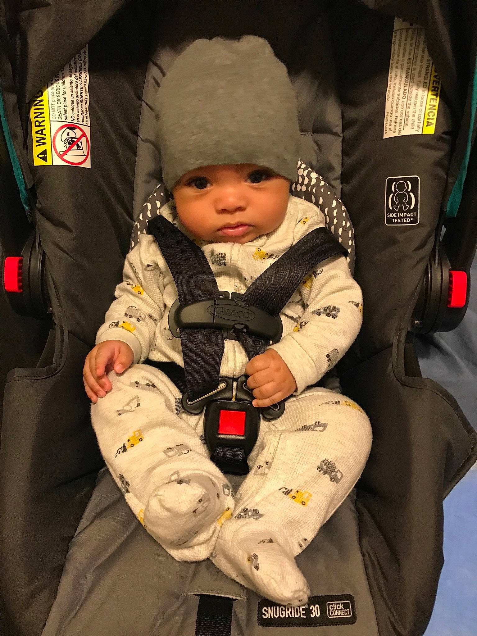 Jaylon is registered to the contest to win money with this photo: baby_in_car_seat, child, person, space