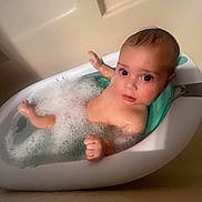 Ezra joined the competition — help win amazing prizes! baby, bathtub, bubble_bath, bathroom, child, foam, water, skin, head, face, expression, sitting, indoor, toddler, young_child, cleaning, relaxing, cute, infant, bath_time
