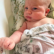 Rayne joined the competition — help win amazing prizes! baby, infant, blanket, bathtub, skin, hand, face, expression, wrapped, newborn, child, water, person, cute, portrait, indoors, soft, fist, looking, serious