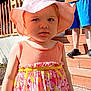 Hazel is registered to the contest to win money with this photo: child, toddler, hat, dress, outdoor, sunlight, stairs, wood, person, curious, summer, colorful, pattern, footwear, expression, clothing, skin, face, nature, daylight