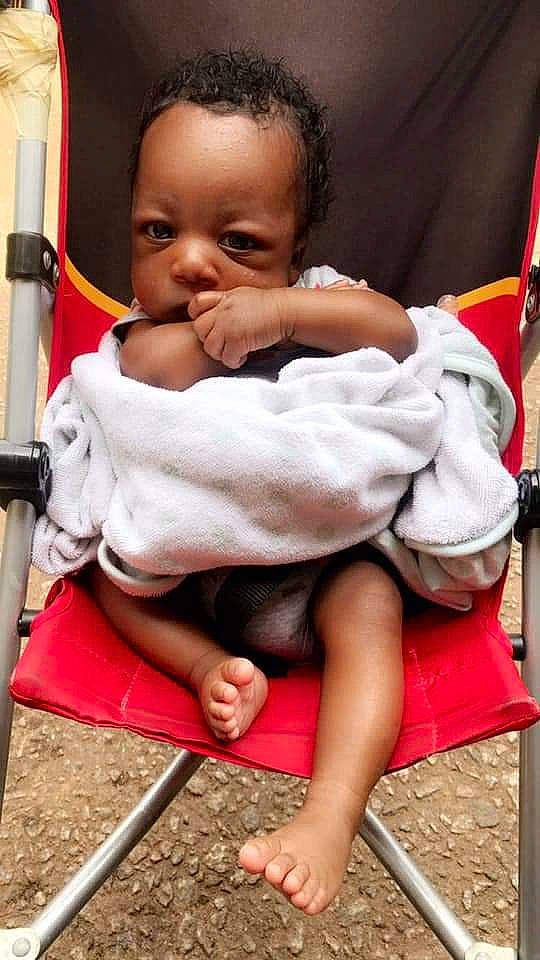 Ty'Merious is registered to the contest to win money with this photo: baby, baby_products, cheek, child, person, product, sitting, skin, smile, toddler