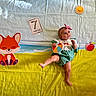 baby, infant, child, toy, ball, headband, fox_illustration, sun_illustration, apple_illustration, blanket, green_outfit, white_lace, 7_months_card, colorful, playful, cute, curious, lying_down, indoors, portrait