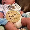 Isaac joined the competition — help win amazing prizes! baby, infant, child, portrait, sitting, milestone, two_months, wooden_sign, construction_trucks, onesie, clothing, blanket, cuddly_toy, chair, indoor, close_up, wide_eyed, open_mouth, family_photo, safe