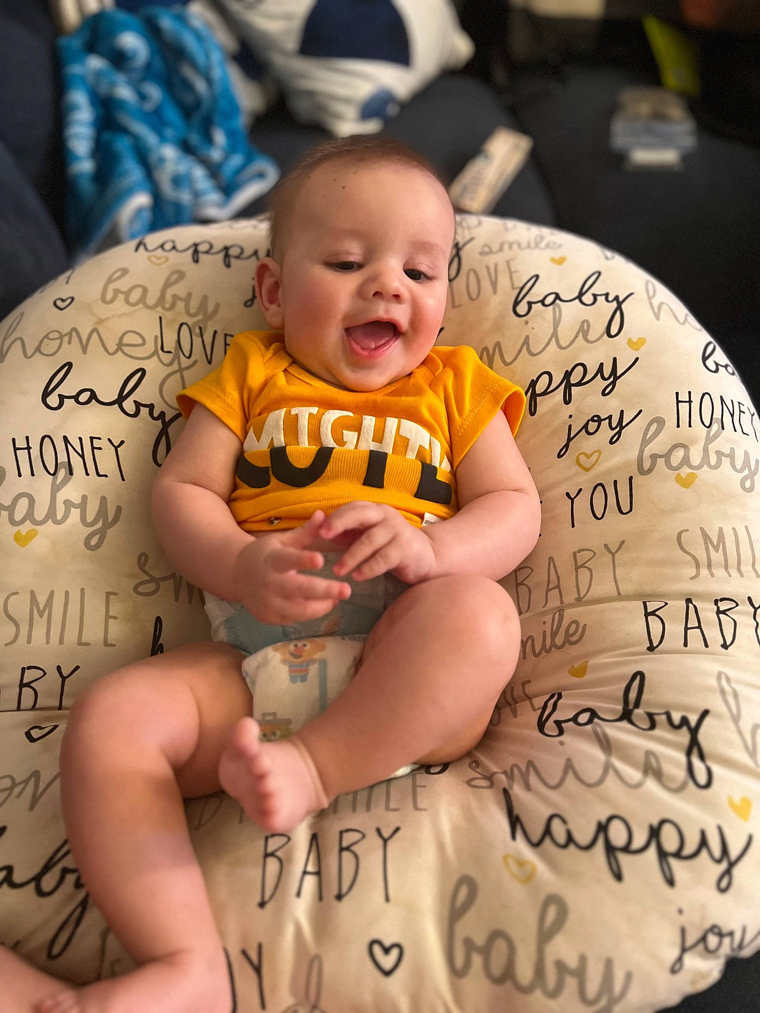 Giovanni is registered to the contest to win money with this photo: arm, baby, baby_toddler_clothing, chair, comfort, eye, facial_expression, finger, flash_photography, hairstyle, happy, human, knee, mouth, muscle, organ, person, smile, t_shirt, thigh