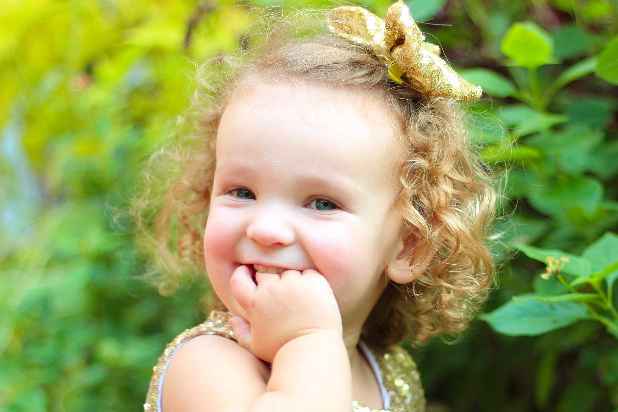 Kendall is registered to the contest to win money with this photo: baby, beauty, blond, cheek, child, child_model, face, facial_expression, fun, grass, hair, hairstyle, happy, head, joy, leaf, people_in_nature, person, skin, smile