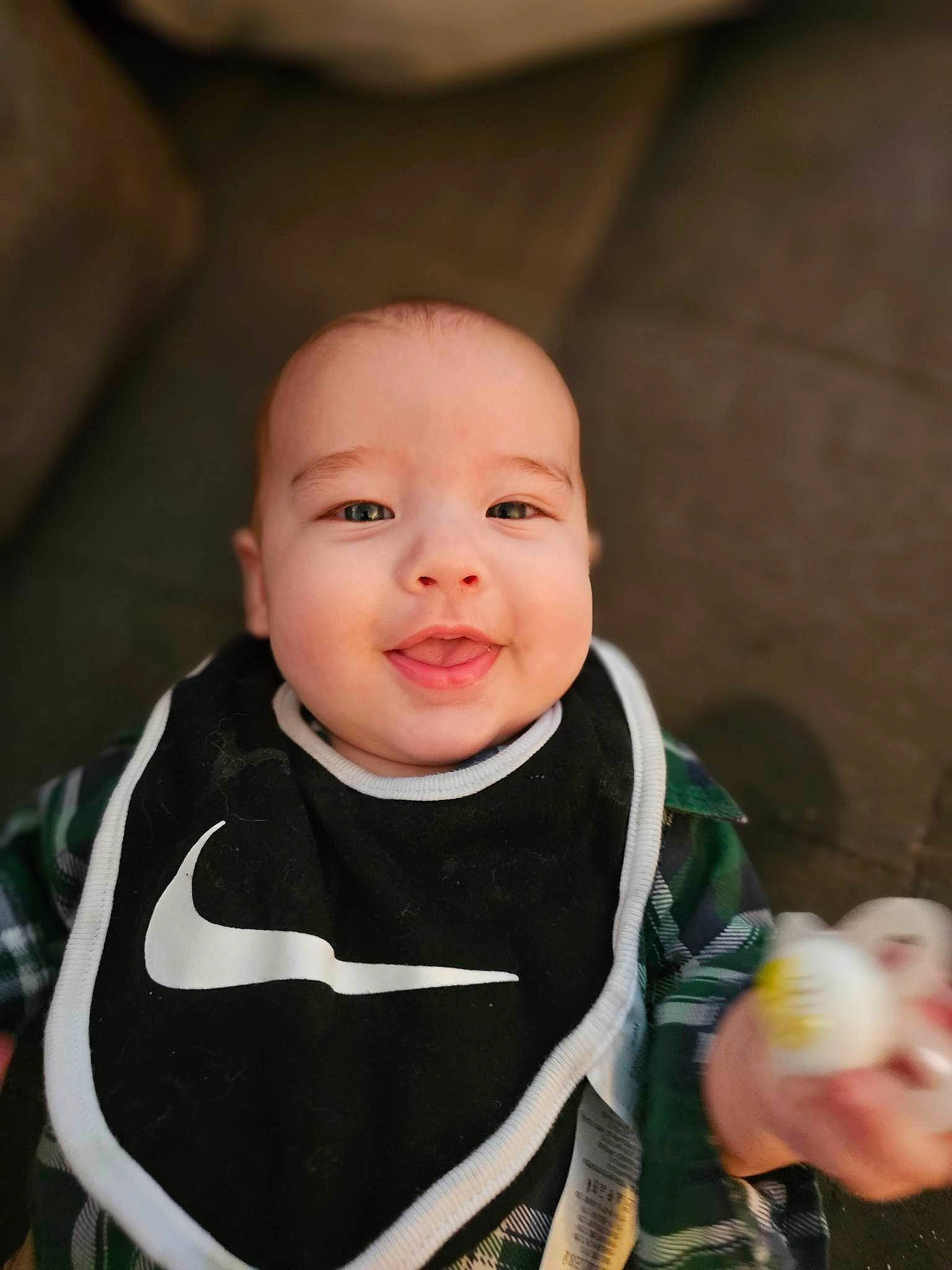 Jonathan is registered to the contest to win money with this photo: baby, baby_carriage, baby_toddler_clothing, cheek, child, clothing, comfort, eye, eyebrow, finger, flash_photography, fun, happy, human_body, iris, nose, person, skin, sleeve, smile