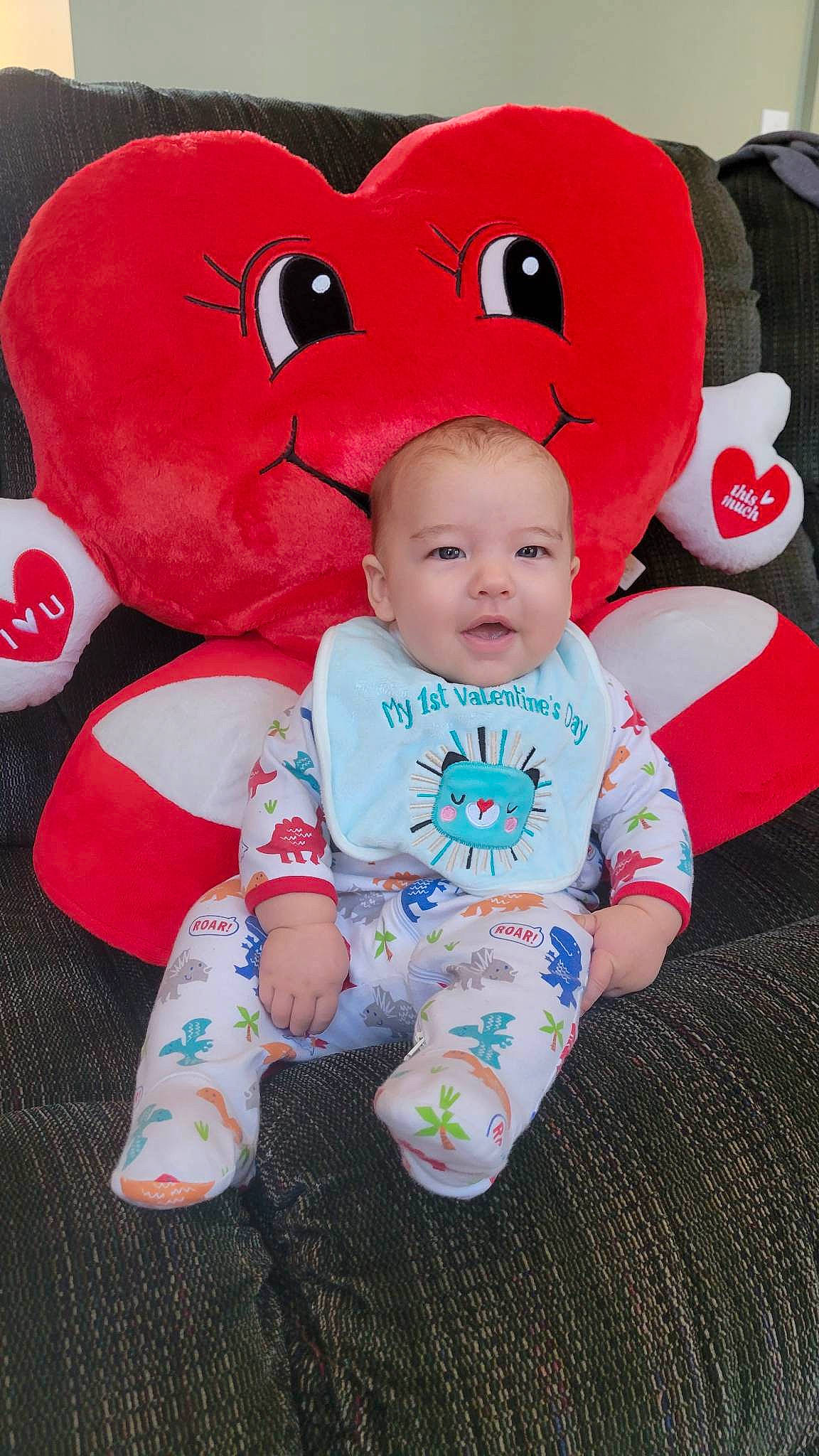 Jonathan is registered to the contest to win money with this photo: baby, baby_toddler_clothing, carmine, cheek, child, comfort, face, fur, happy, head, pattern, person, pink, plush, product, skin, sleeve, smile, stuffed_toy, textile