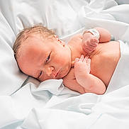 Soryn is registered to the contest to win money with this photo: newborn, baby, infant, skin, face, hand, blanket, white, bed, sleeping, resting, hospital, wristband, soft, cute, small, lying_down, newborn_baby, fresh, wrapped