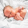 newborn, baby, infant, skin, face, hand, blanket, white, bed, sleeping, resting, hospital, wristband, soft, cute, small, lying_down, newborn_baby, fresh, wrapped