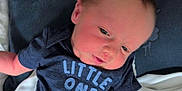 Soryn joined the competition — help win amazing prizes! baby, infant, child, clothing, shirt, text, bed, pillow, blanket, hand, face, skin, person, casual, indoors, cozy, newborn, sleepwear, fabric, portrait