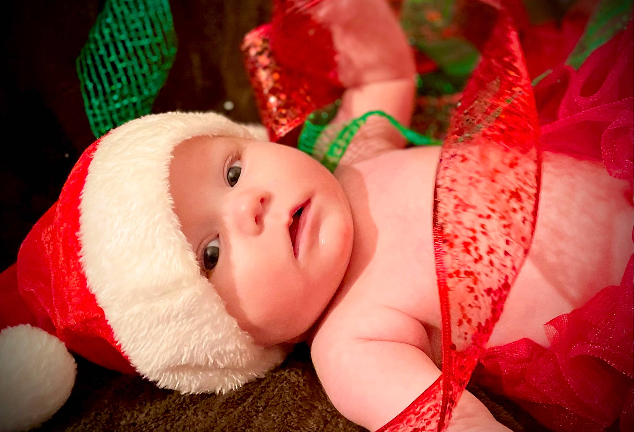 Harper joined the competition — help win amazing prizes! baby, baby_toddler_clothing, carmine, child, christmas_ornament, event, eye, fashion_accessory, fictional_character, hand, happy, hat, head, headwear, holiday, human_body, lip, person, pink, plant