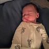 Haven is registered to the contest to win money with this photo: baby, newborn, sleeping, pajamas, koala_print, blanket, bed, infant, child, soft_lighting, peaceful, cute, cozy, indoors, resting, face, person, sleep, clothing, comfort