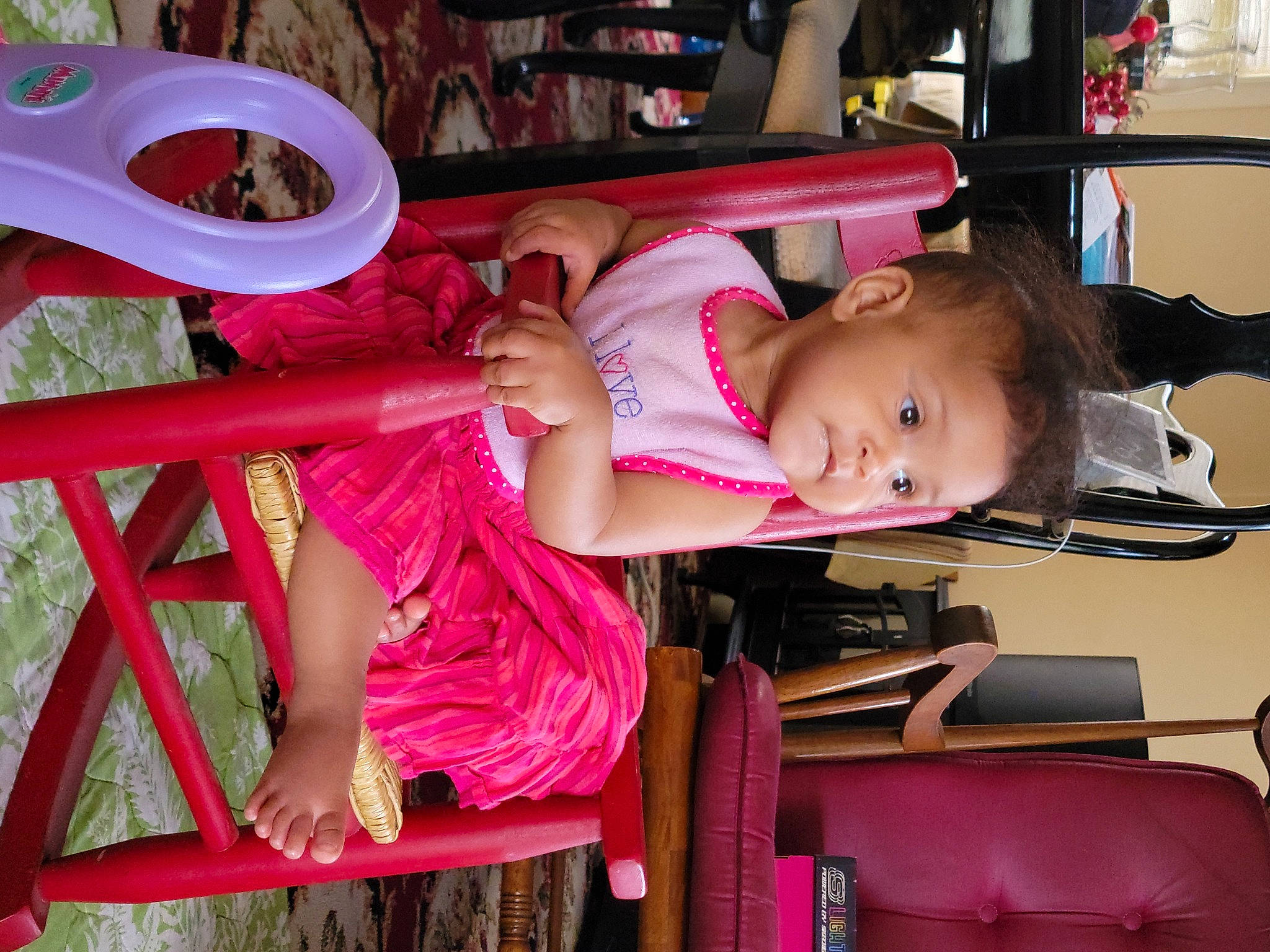 Maya joined the competition — help win amazing prizes! baby, baby_toddler_clothing, beauty, child, comfort, dress, fun, leisure, magenta, outdoor_furniture, person, pink, product, room, sandal, sitting, skin, smile, thigh, toddler