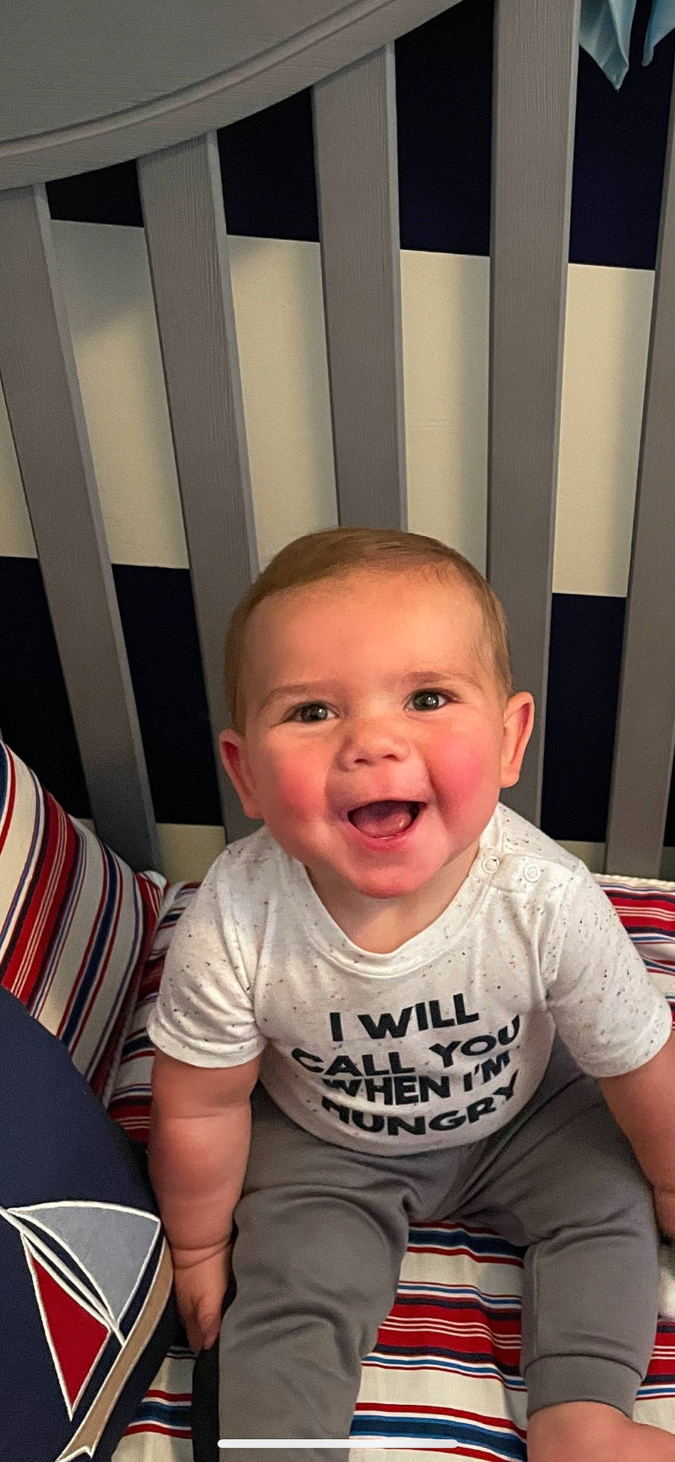 Jerry is registered to the contest to win money with this photo: baby, baby_toddler_clothing, cheek, child, chin, eyebrow, eyelash, flooring, fun, happy, iris, mouth, nose, people, person, sitting, skin, sleeve, smile, t_shirt